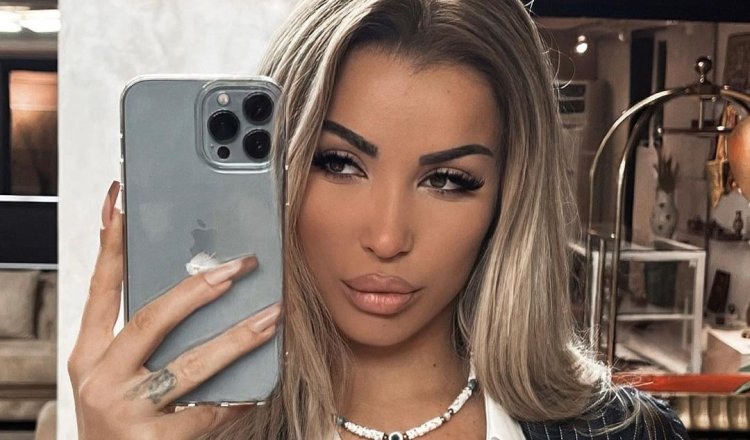 Roza Lati i beson vetëm peshqirit për dalje në publik